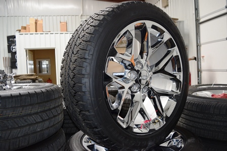 Chevy 22 inch oem chrome wheels bridgestone AT tires